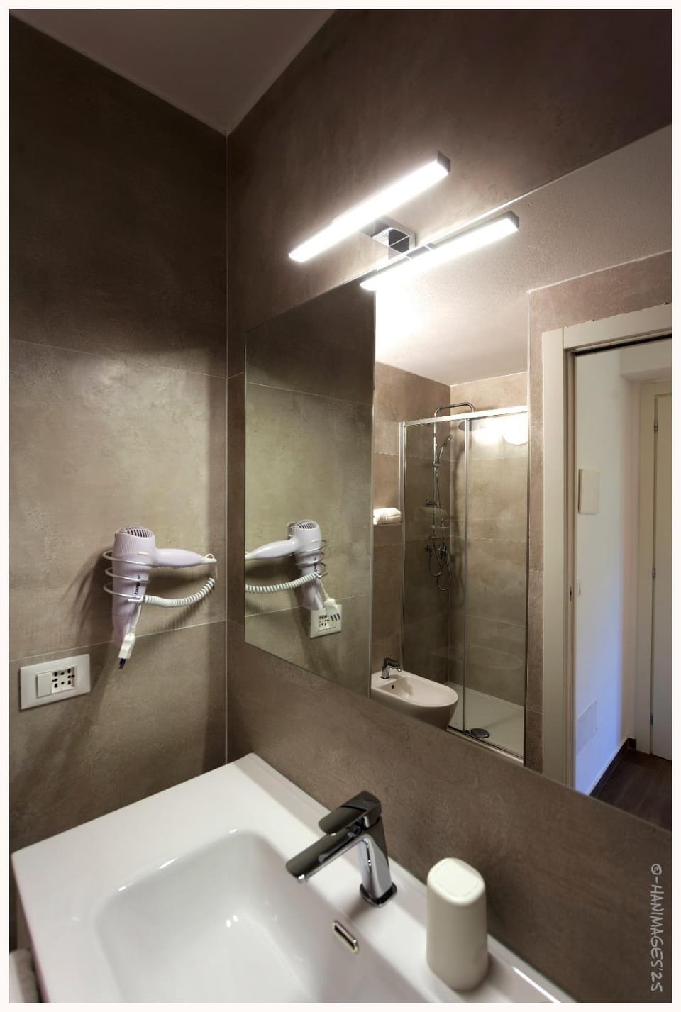 Shower, Bathroom, hair dryier, towels, air conditioner