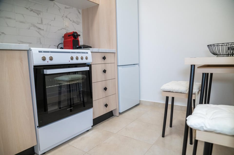 Kitchen or kitchenette, oven, stove