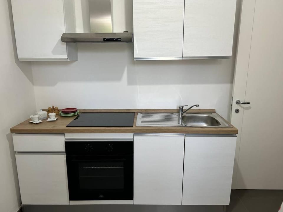 Kitchen or kitchenette, oven, stove