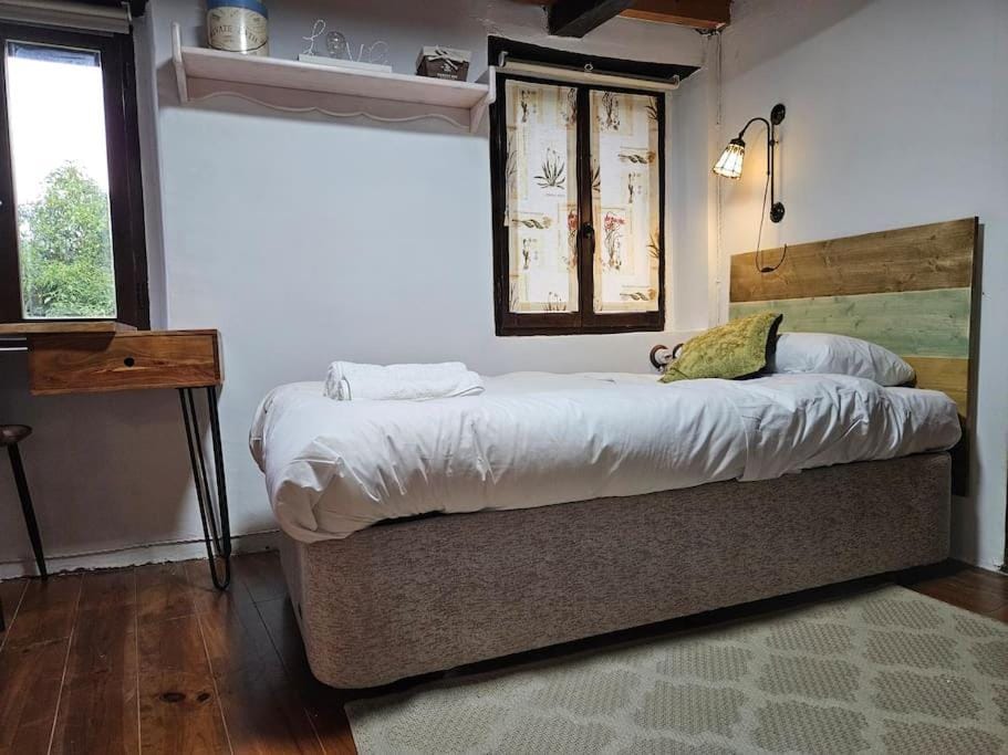 La casita de Orión,Piloña 37A01 by R2R Consulting Chalet in Asturias