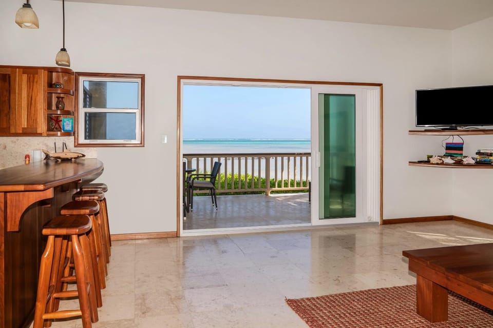 Residences at Barrier Reef 10-3A Oceanfront 2 BR by Stay Floreo House in Corozal District