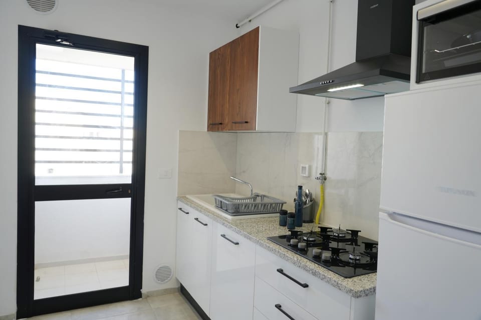 Kitchen or kitchenette, oven, stove