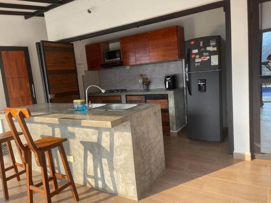 Kitchen or kitchenette, dishwasher, stove