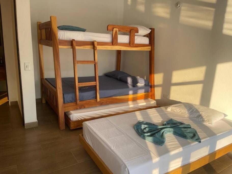 Bed, Photo of the whole room, Bedroom, bunk bed, towels