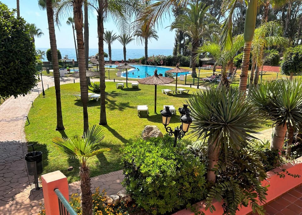 Property building, Spring, Natural landscape, Garden, Beach, Sea view, Swimming pool, sunbed