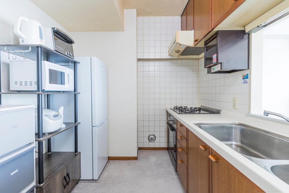 Kitchen or kitchenette, stove