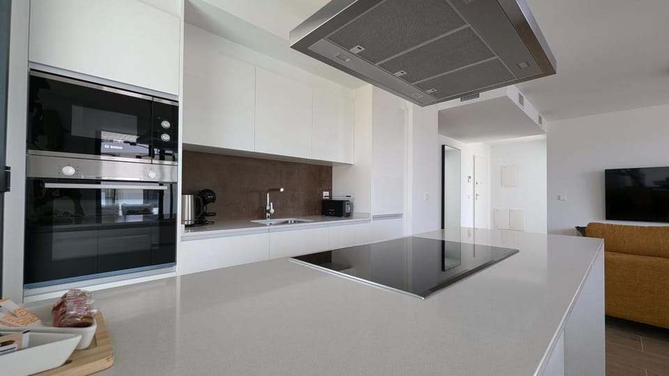 Kitchen or kitchenette, oven, stove