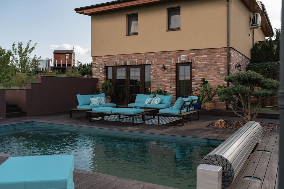 Property building, Patio, Day, Balcony/Terrace, Seating area, Garden view, Pool view, Swimming pool