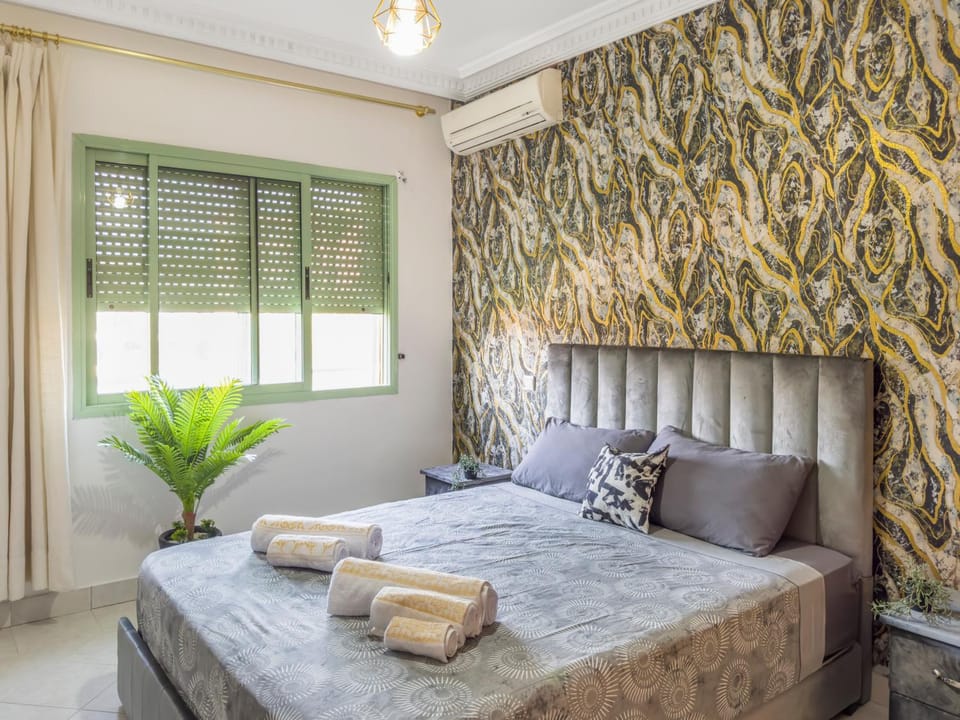 Bedroom, towels, wardrobe, air conditioner