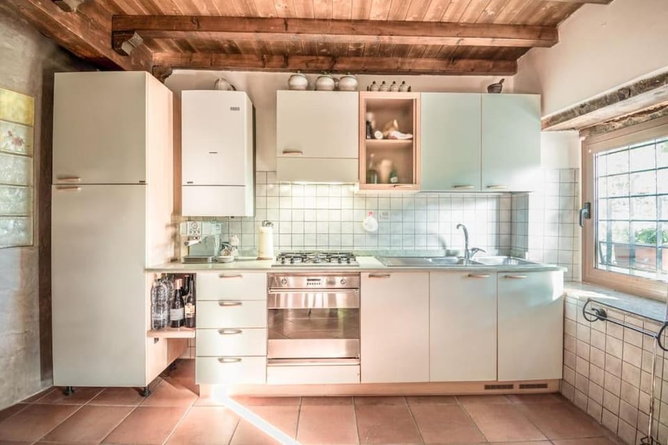 Kitchen or kitchenette, oven, stove
