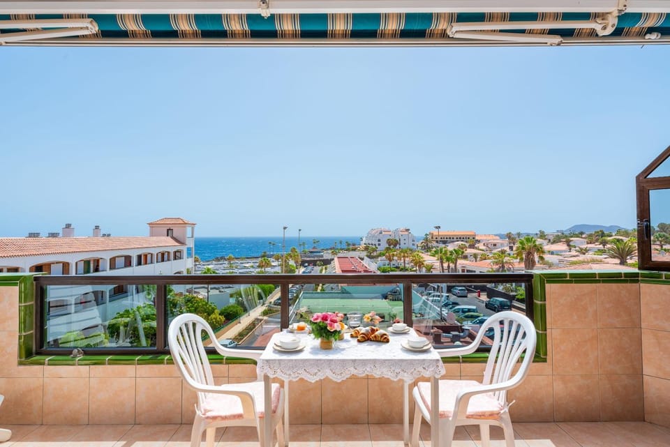 Property building, Patio, Day, Natural landscape, View (from property/room), Balcony/Terrace, Dining area, City view, Sea view