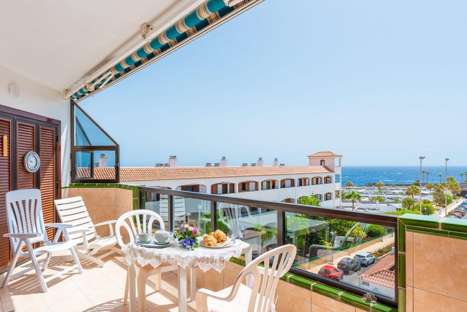 Property building, Patio, Day, Natural landscape, View (from property/room), Balcony/Terrace, Seating area, Dining area, Sea view
