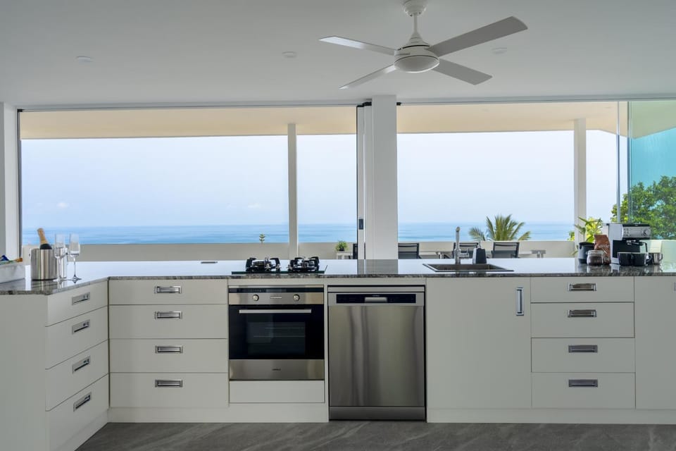 Kitchen or kitchenette, Sea view, dishwasher, oven, stove