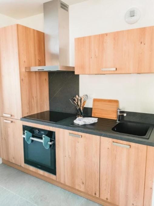 Kitchen or kitchenette, oven, stove
