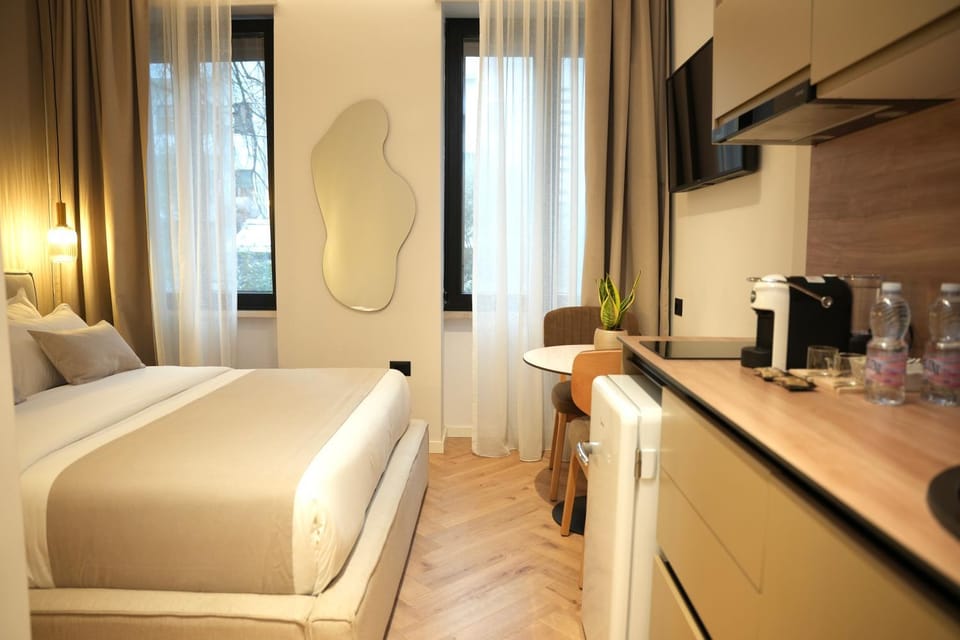 Bed, Coffee/tea facilities, Kitchen or kitchenette, Photo of the whole room, Seating area