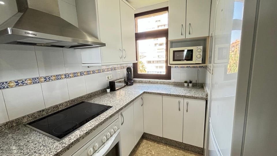 Kitchen or kitchenette, oven, stove