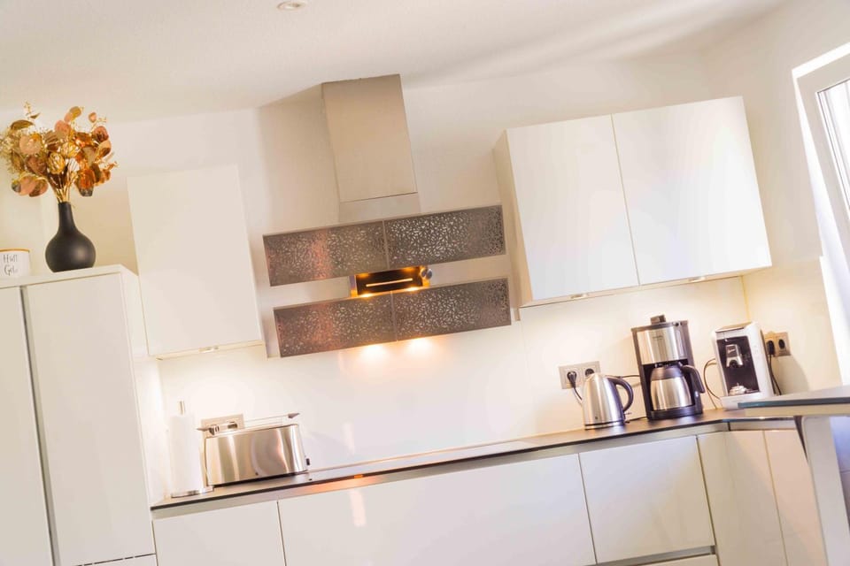 Kitchen or kitchenette, stove, toaster