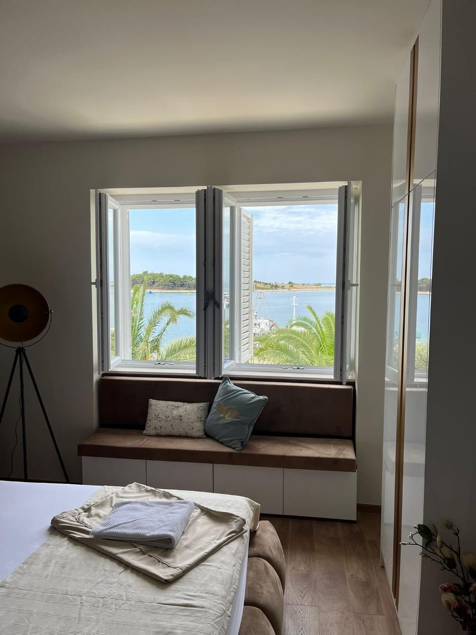 Bed, Natural landscape, Seating area, Bedroom, Sea view