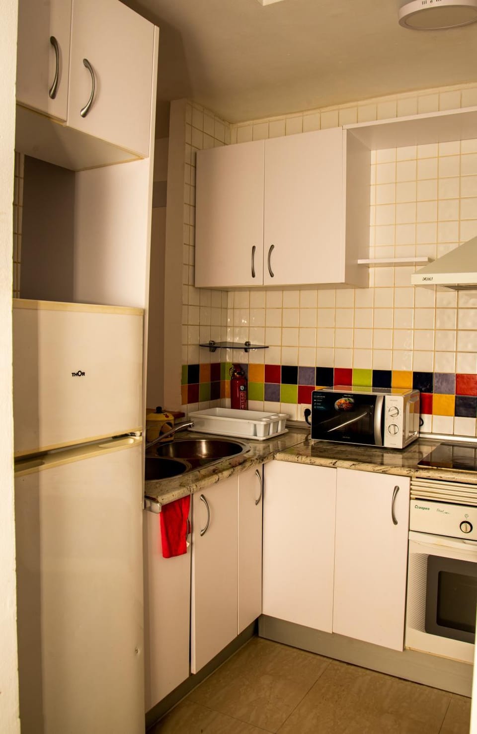 Kitchen or kitchenette, microwave, oven, stove, kitchen
