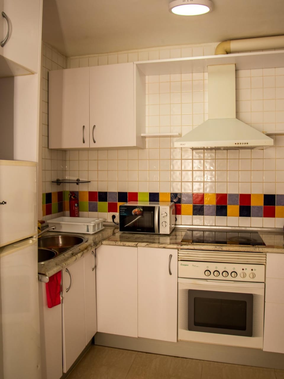 Kitchen or kitchenette, stove, kitchen