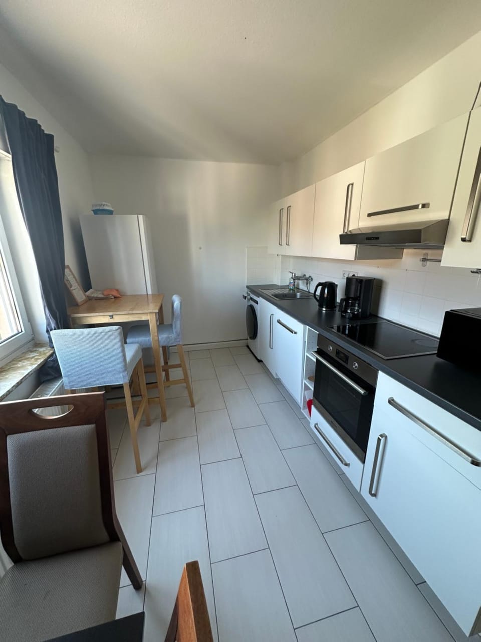 Kitchen or kitchenette, Dining area, dishwasher, oven, stove, toaster, washing machine, dryer