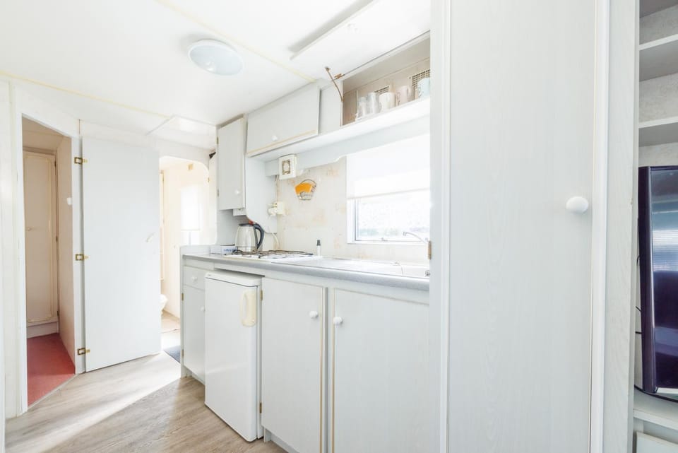 Kitchen or kitchenette, oven, stove