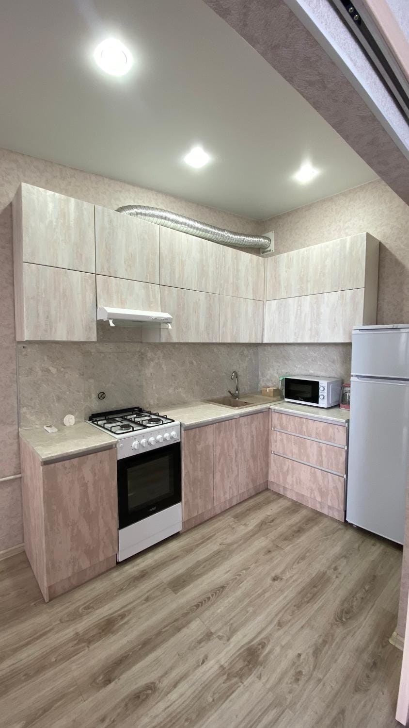 Kitchen or kitchenette, oven, stove