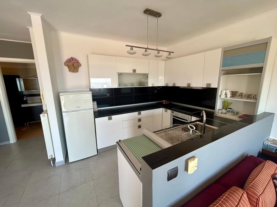 Kitchen or kitchenette, oven