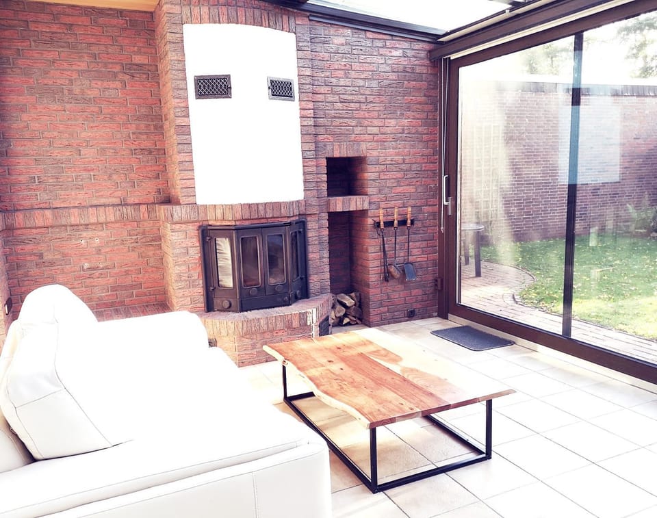 Living room, Seating area, Garden view, fireplace, heating, internet