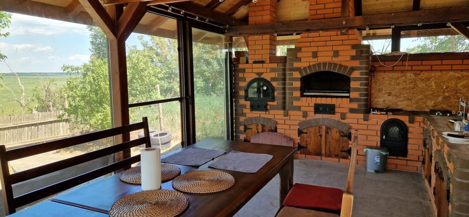 BBQ facilities, BBQ facilities, View (from property/room), Kitchen or kitchenette, Kitchen or kitchenette, Seating area, Dining area