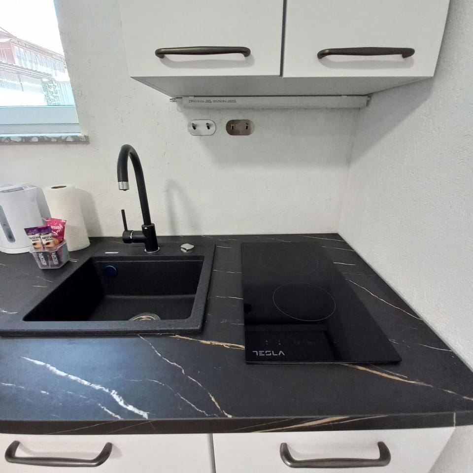 Kitchen or kitchenette, stove