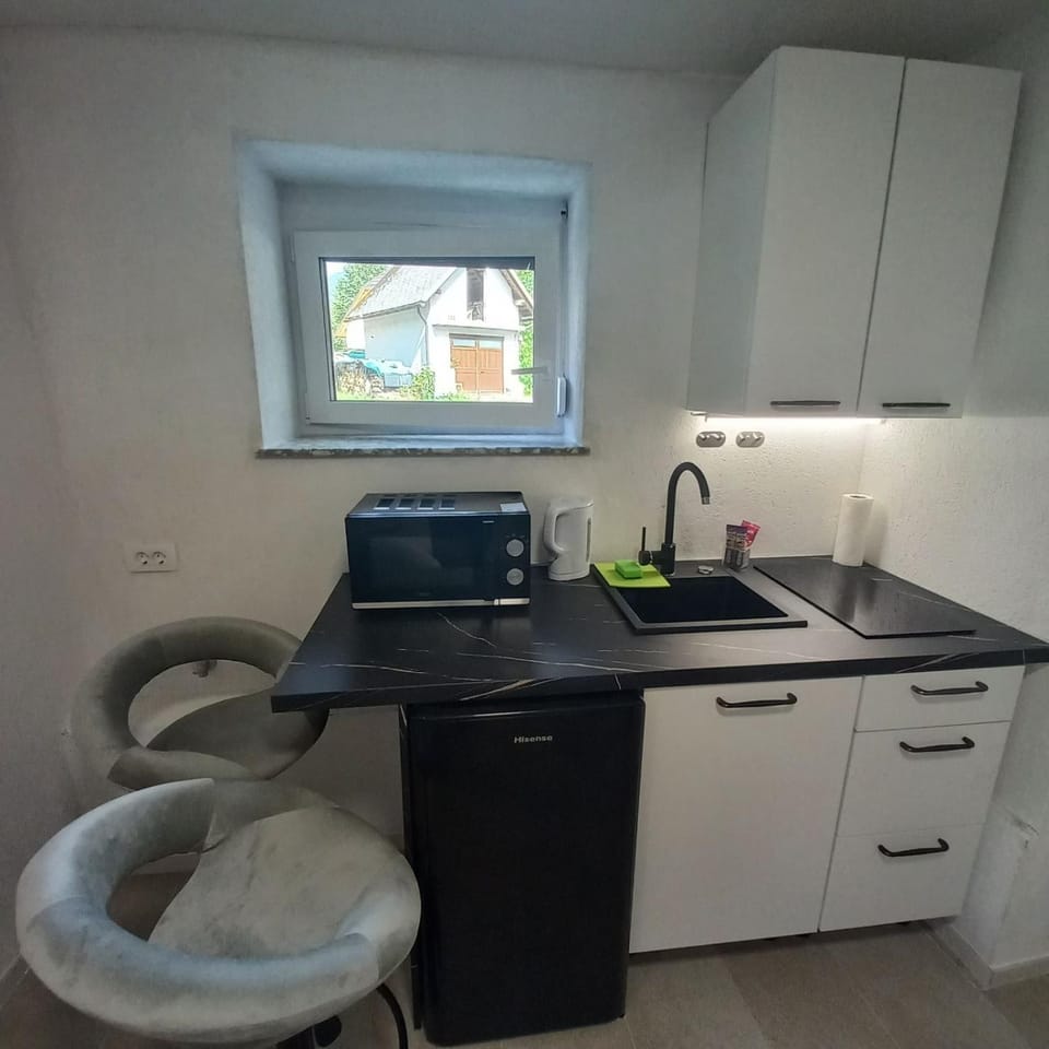 Kitchen or kitchenette, stove