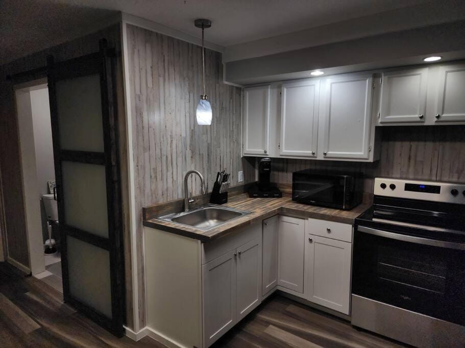 Kitchen or kitchenette, oven, stove, toaster
