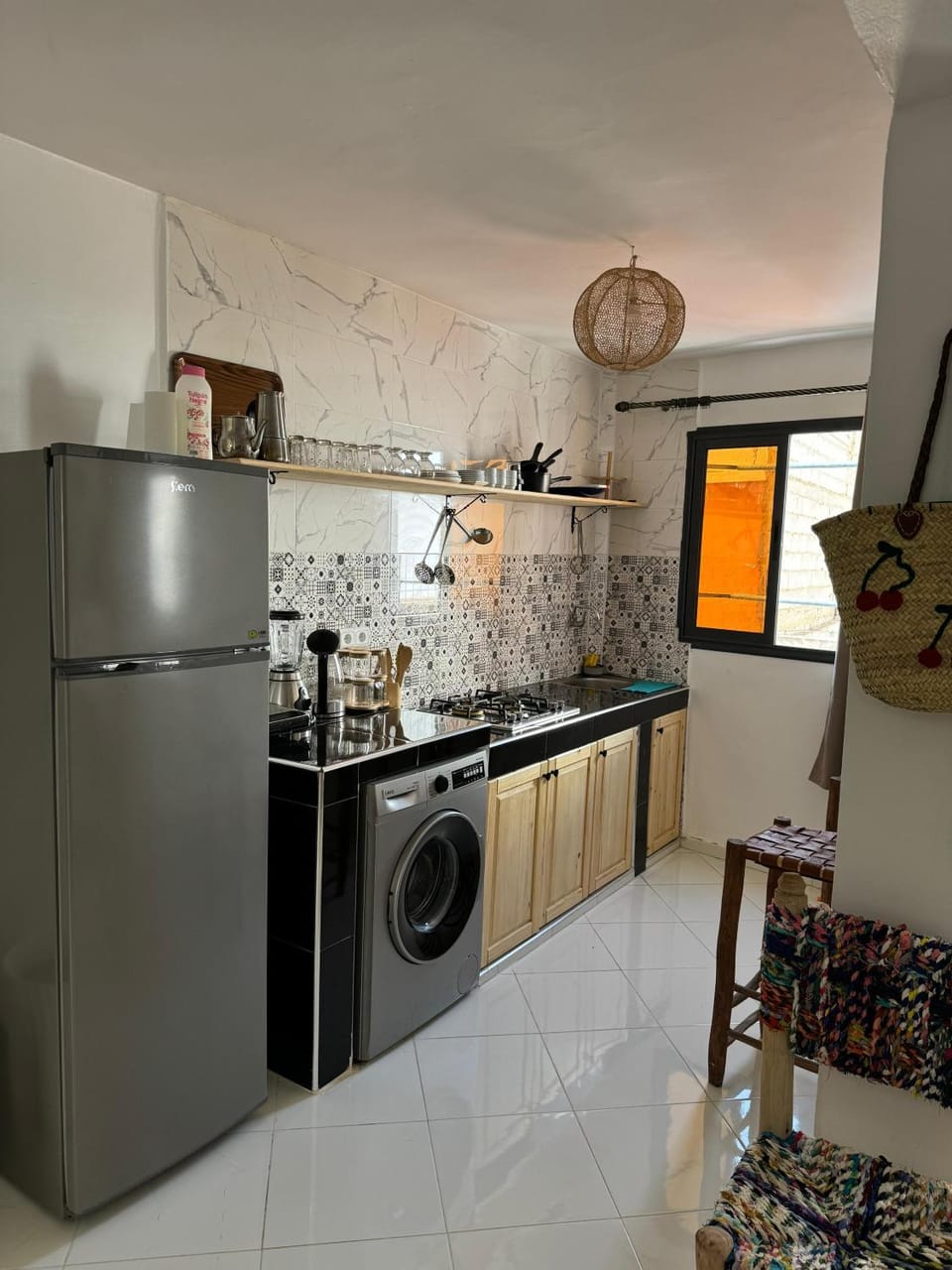 Kitchen or kitchenette, washing machine