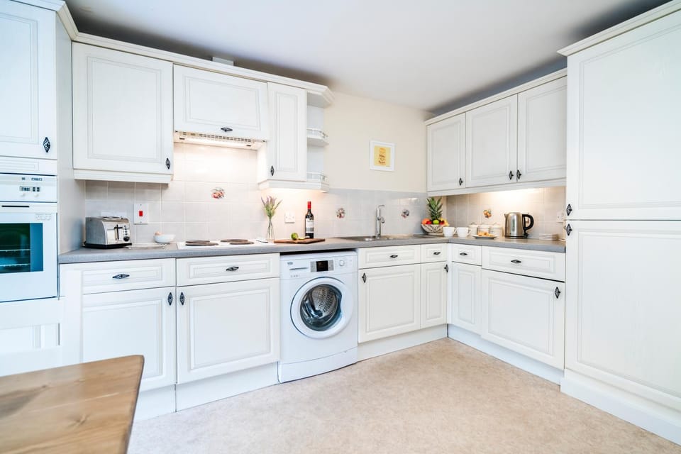 oven, stove, toaster, washing machine, kitchen