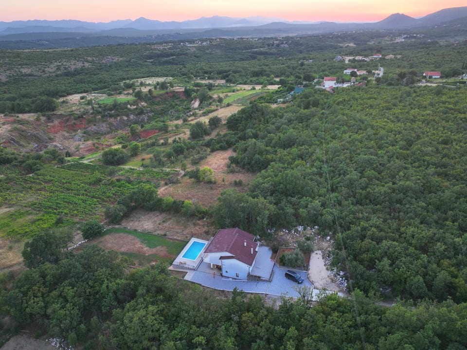 Property building, Natural landscape, Bird's eye view