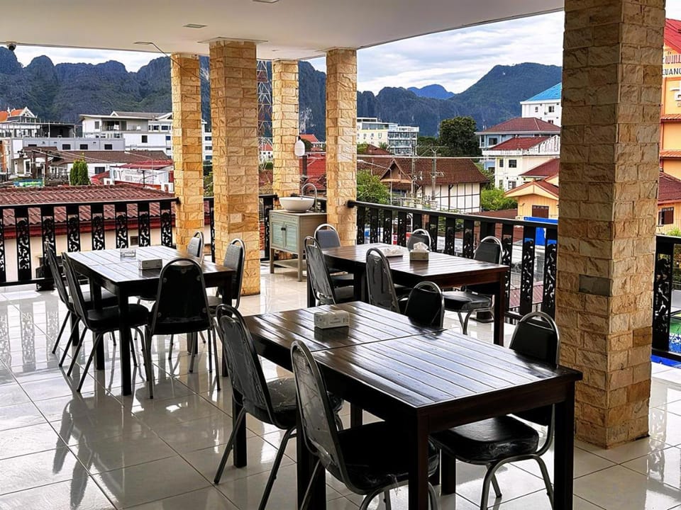 Property building, Patio, Restaurant/places to eat, Day, Natural landscape, City view, Mountain view