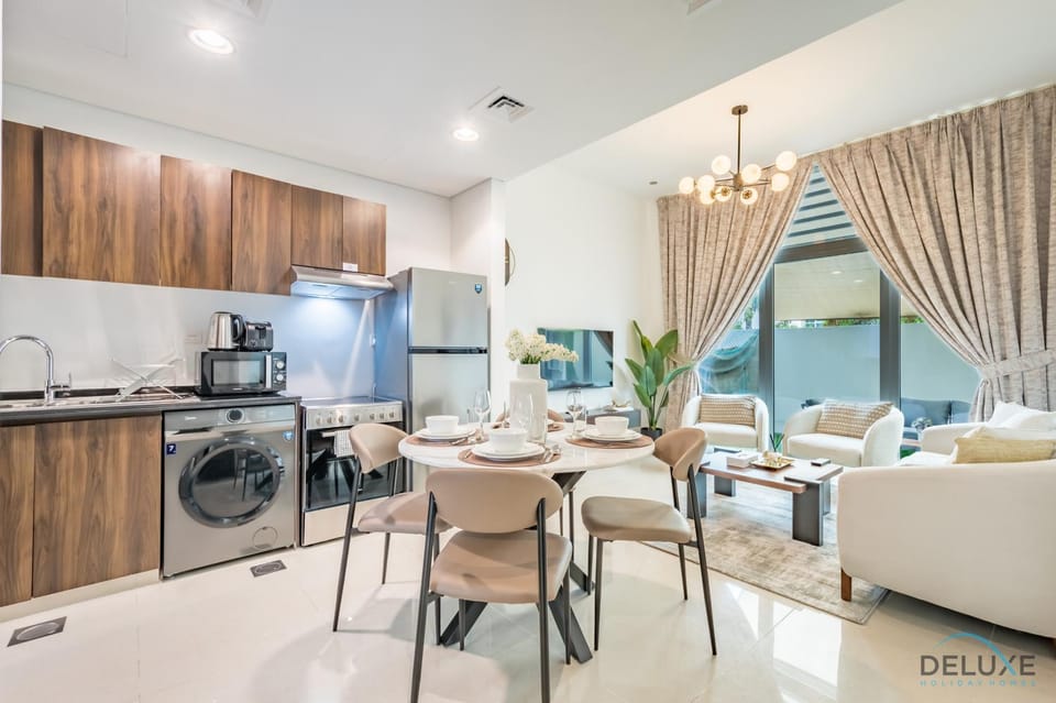 Kitchen or kitchenette, Living room, Dining area, oven, stove, toaster, washing machine