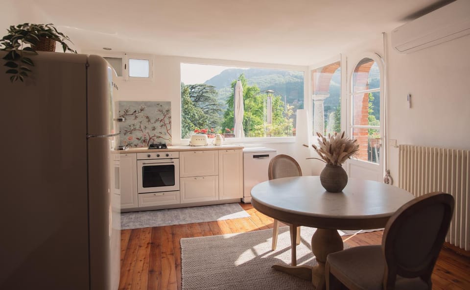 Living room, Seating area, Dining area, oven, stove, kitchen