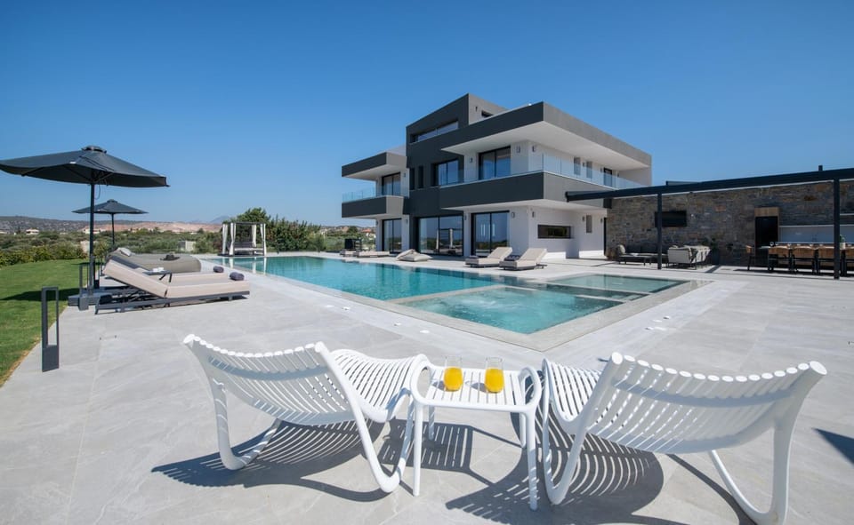 Property building, Patio, Pool view, Swimming pool, sunbed