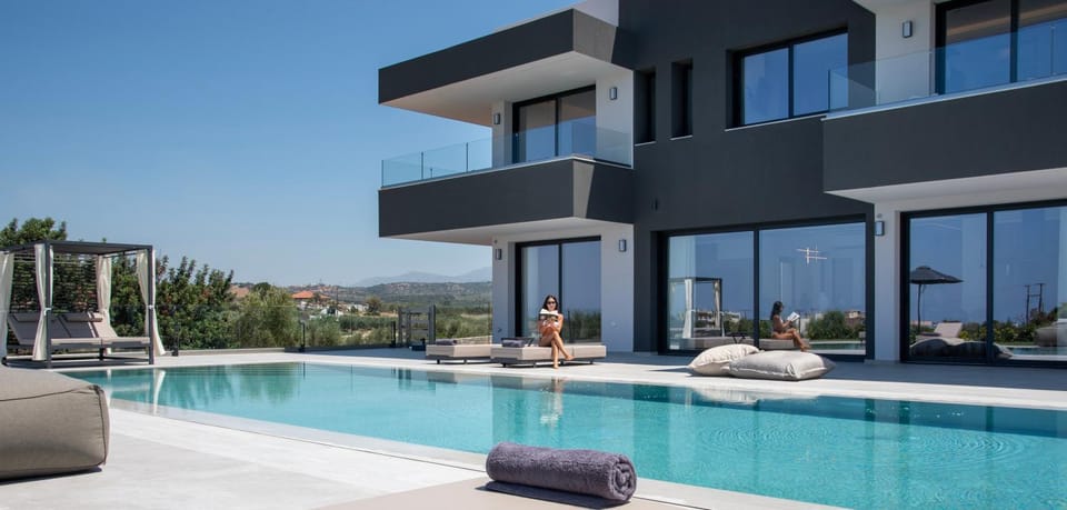 Property building, Seating area, Pool view, Swimming pool, sunbed
