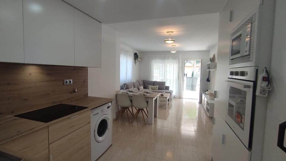 Kitchen or kitchenette, Dining area, oven, stove, washing machine