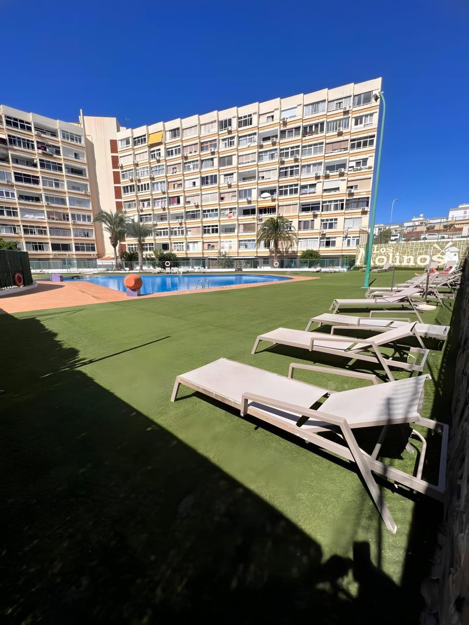 Property building, Living room, Swimming pool