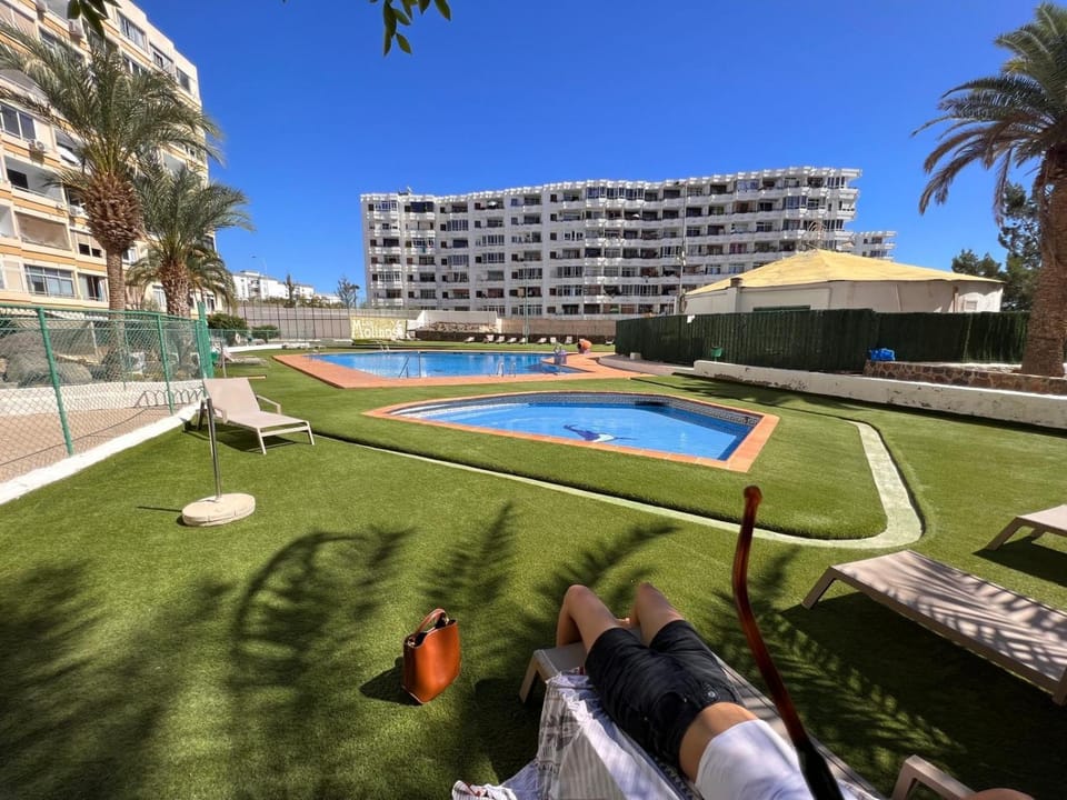 Property building, Living room, Swimming pool
