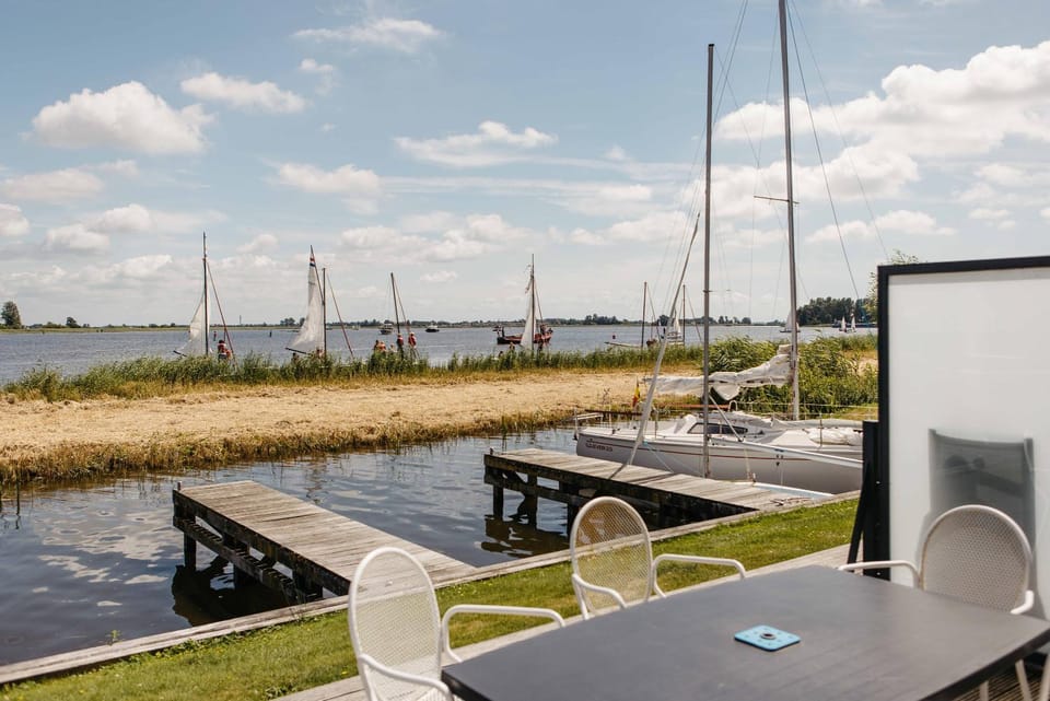 Luxury Townhouses in Heeg (6 & 8 Guests) with Roof Terrace, Views & Private Dock on the Heegermeer Campground/ 
RV Resort in Friesland, Netherlands
