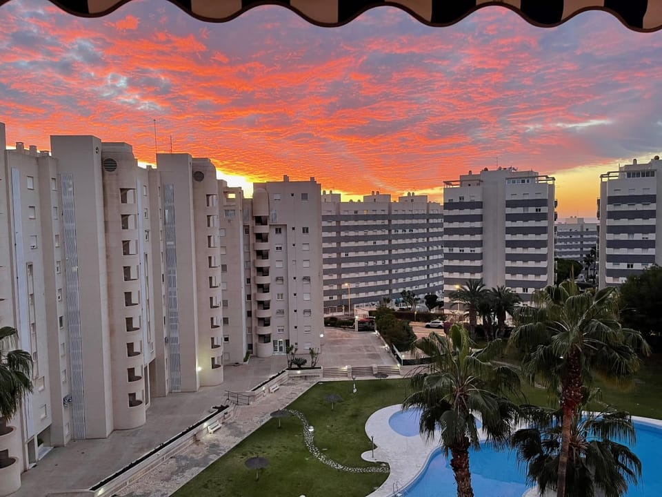 Property building, Swimming pool, Sunset