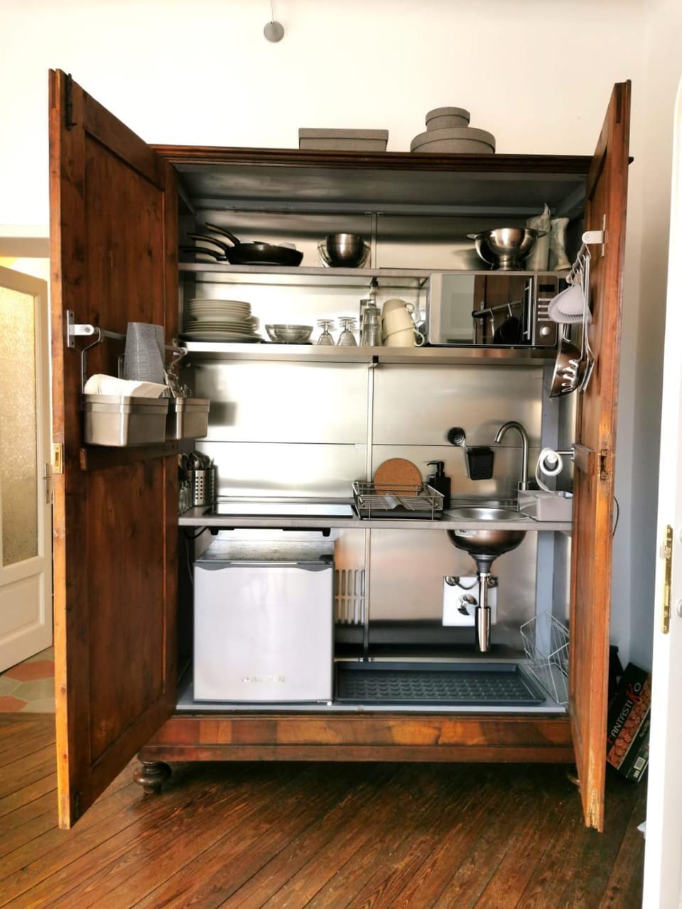 Kitchen or kitchenette, microwave, stove, toaster