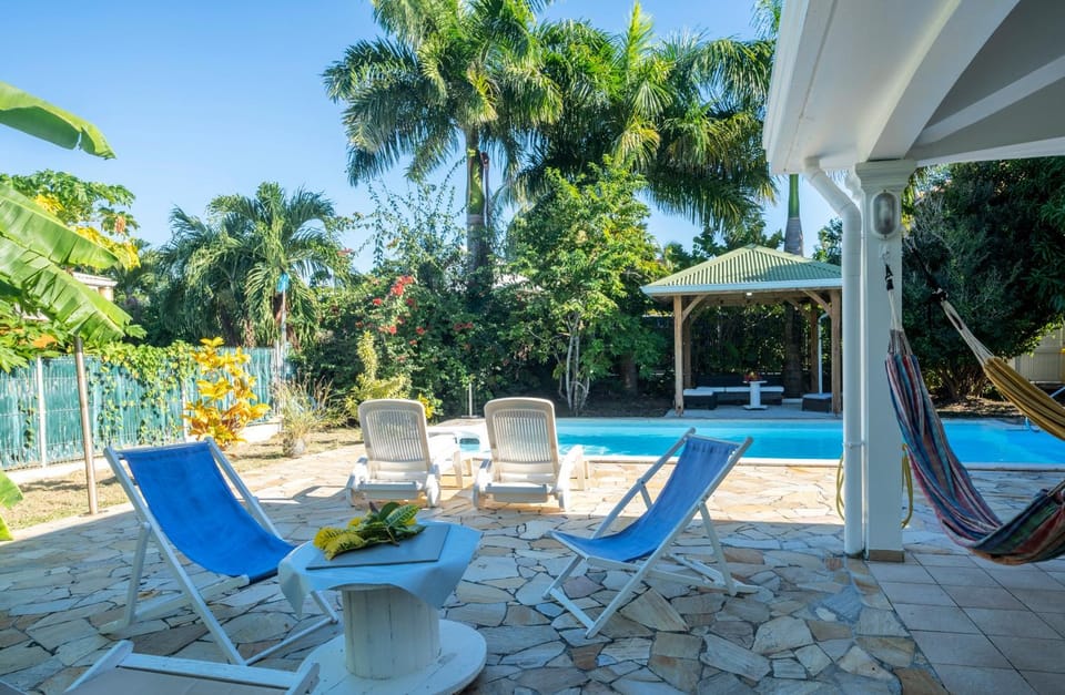 Patio, Day, Garden, Pool view, Swimming pool, sunbed