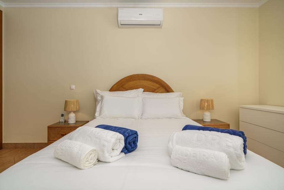 Bed, Photo of the whole room, Bedroom, towels, air conditioner