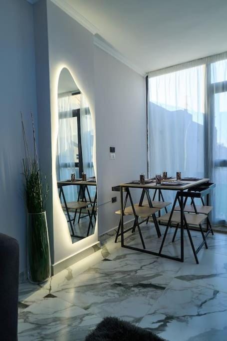 استديو فندقي-بجلسة خارجية-بالقاهرة بمدينة اكتوبر Apartment in Egypt